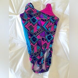 Leo by MotionWear.  Sz Large Child LC (10/12) EXCELLENT CONDITION